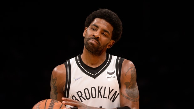 Kyrie Irving reacts after a foul call.